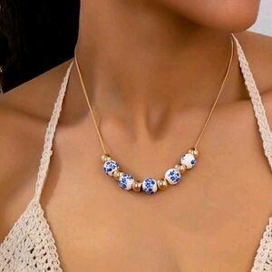 Elegant Gold and Blue Beaded Necklace